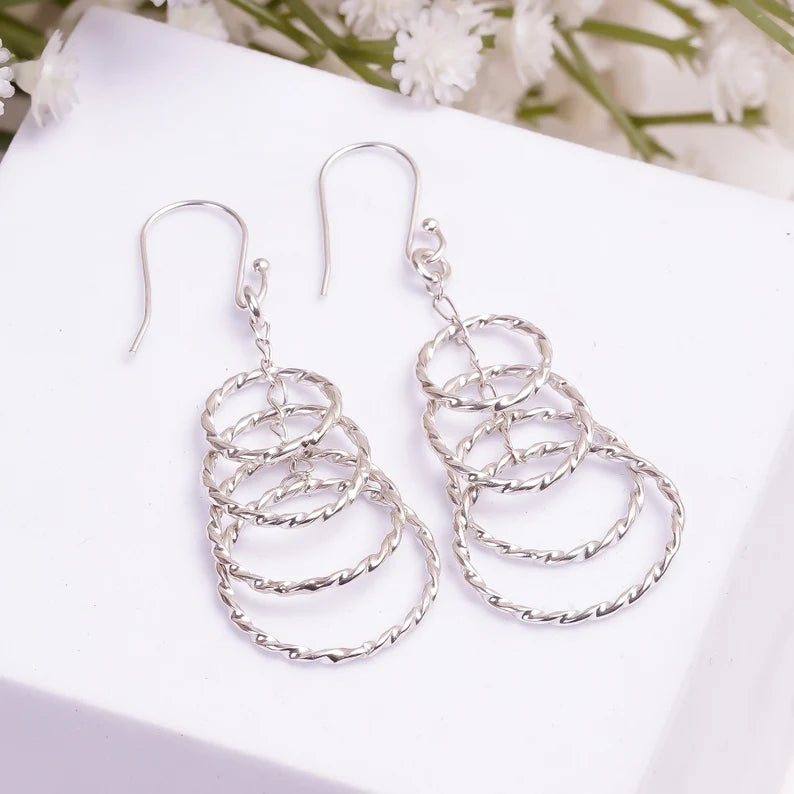 Handcrafted Round Drop And Dangle Earrings