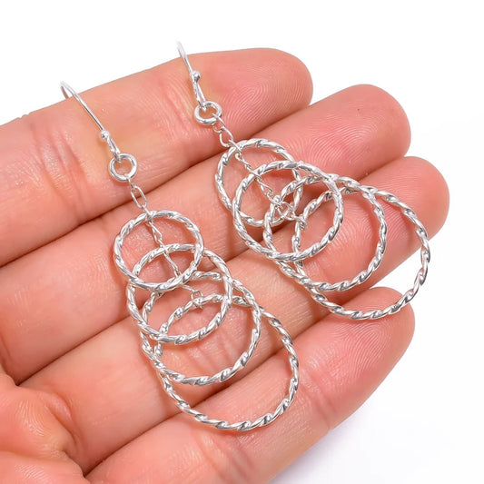 Handcrafted Round Drop And Dangle Earrings